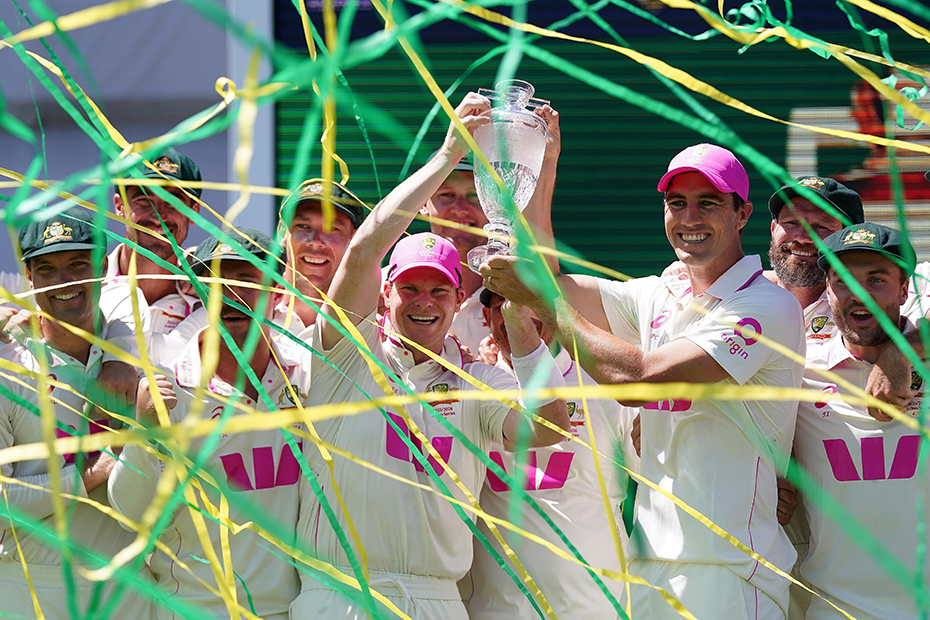 Australia's Steve Smith (centre) and Pat Cummins (right) lift the Ashes trophy on day five of the fifth NRMA Insurance Ashes Series 2025 test at the Sydney Cricket Ground, Australia. 