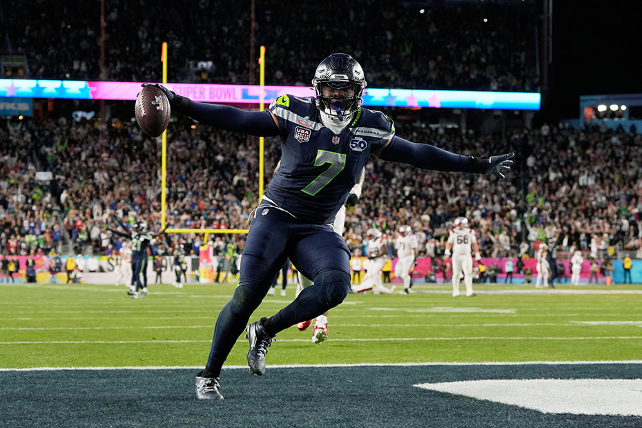 Seattle Seahawks linebacker Uchenna Nwosu celebrates after scoring against the New England Patriots during the second half of the NFL Super Bowl 60 football game
